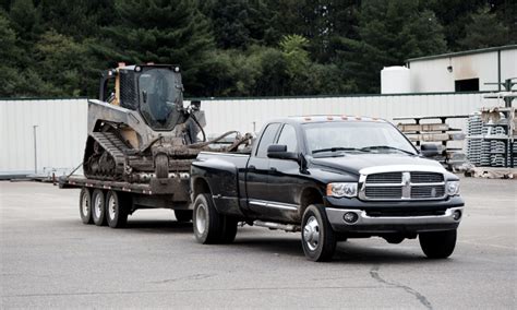 rams trucks pulling a trailer with skid steer|Opinion on Towing Capacity .